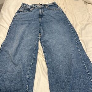 This is a high-rise wide leg, jean